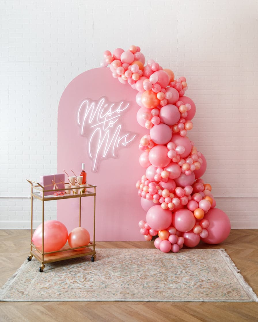 Rosé Bubbles - The Aadi Panel with Garland and Neon Sign | Purchase