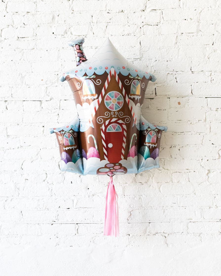 37in Gingerbread House Foil Balloon with Pink Skirt | Purchase